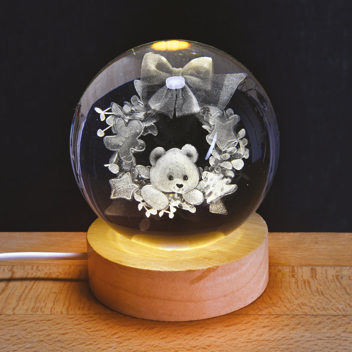 Sfera in vetro con base in legno e LED “Orsetto”