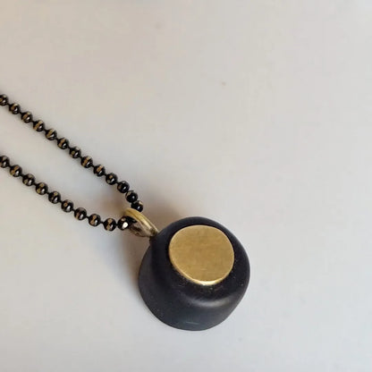 COLLANA ARTIGIANALE ECLISSI IN ARDESIA E OTTONE
